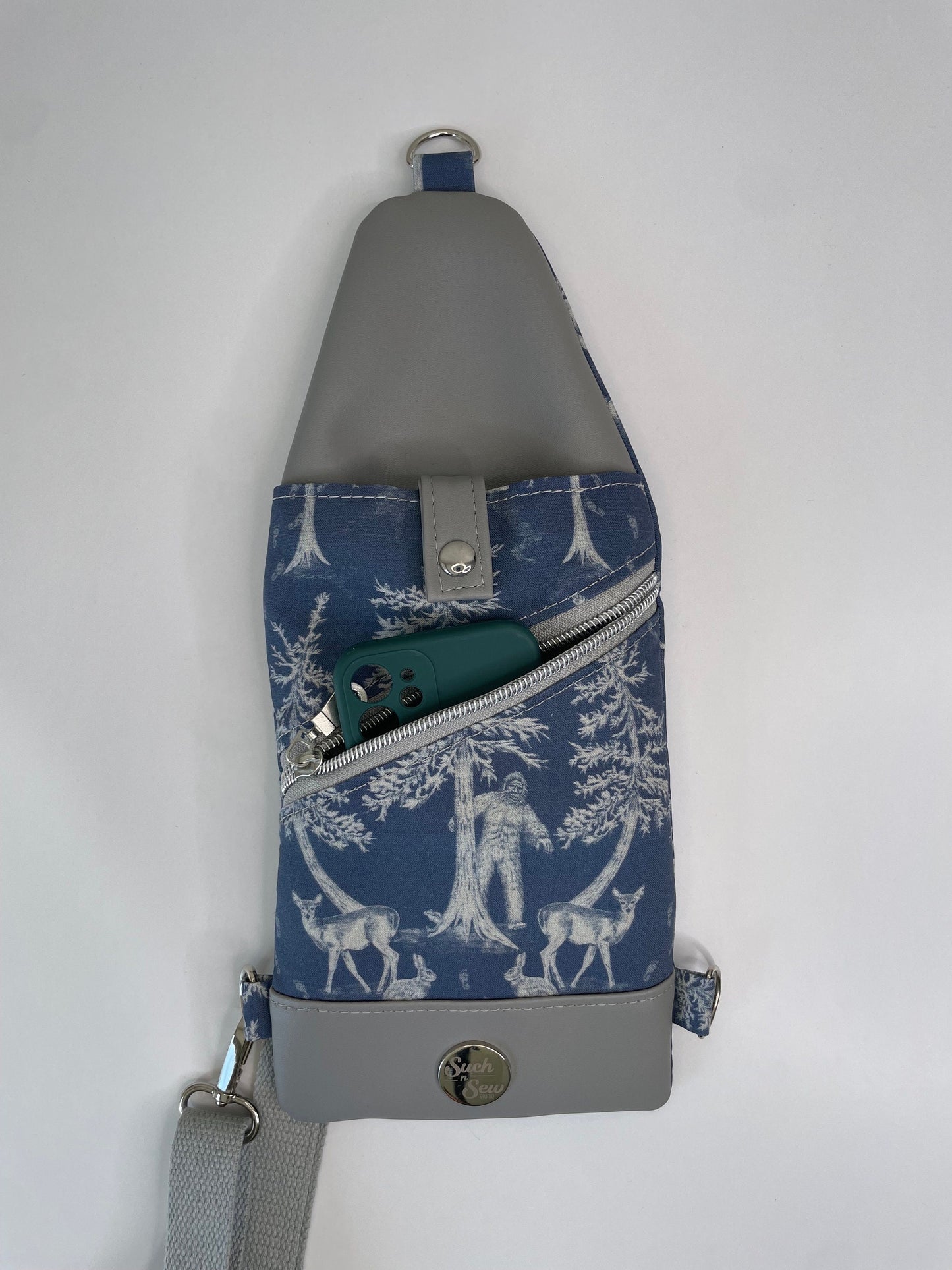 Thin and Compact Bigfoot Sling Bag Featuring Alien Friend