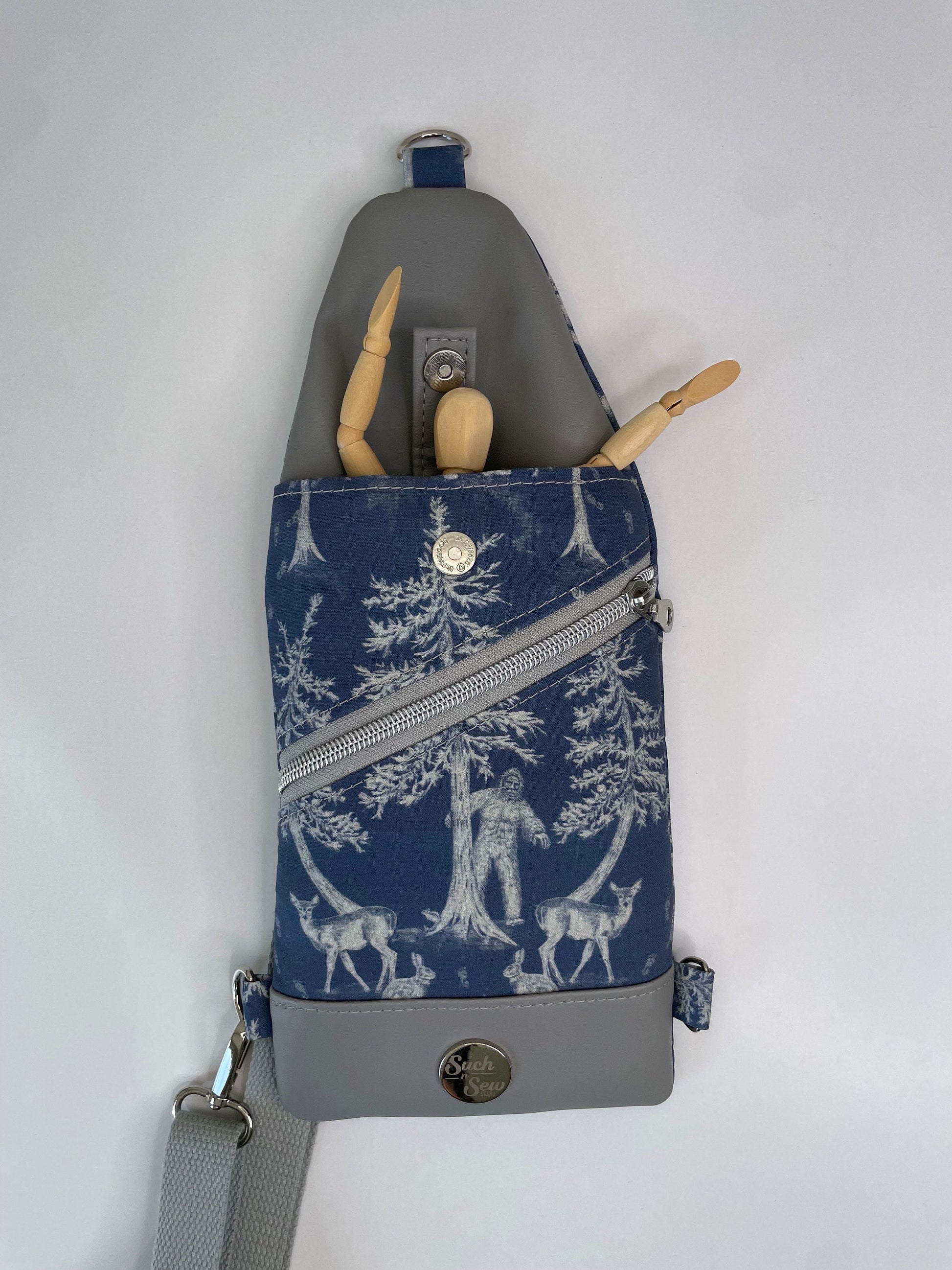 Thin and Compact Bigfoot Sling Bag Featuring Alien Friend