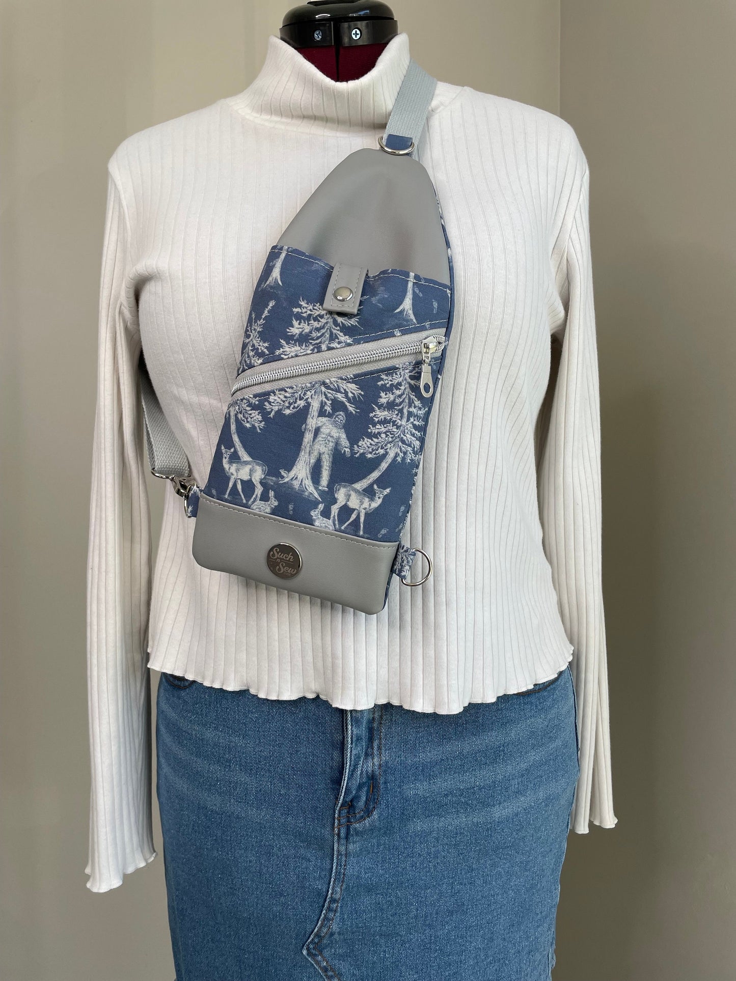 Thin and Compact Bigfoot Sling Bag Featuring Alien Friend