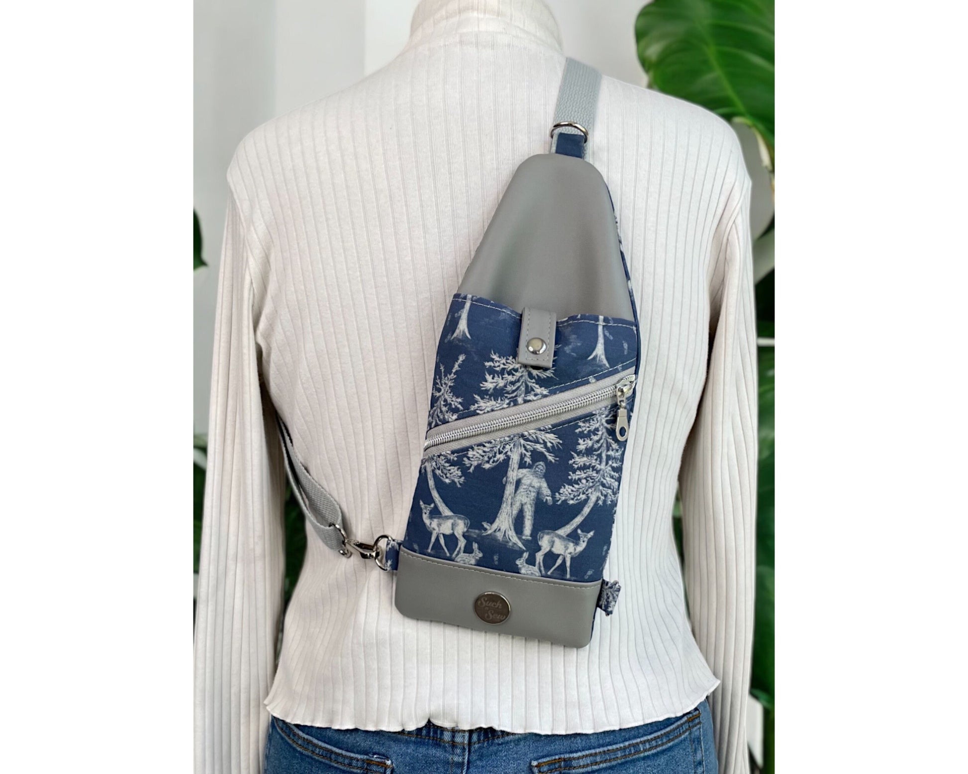 Thin and Compact Bigfoot Sling Bag Featuring Alien Friend