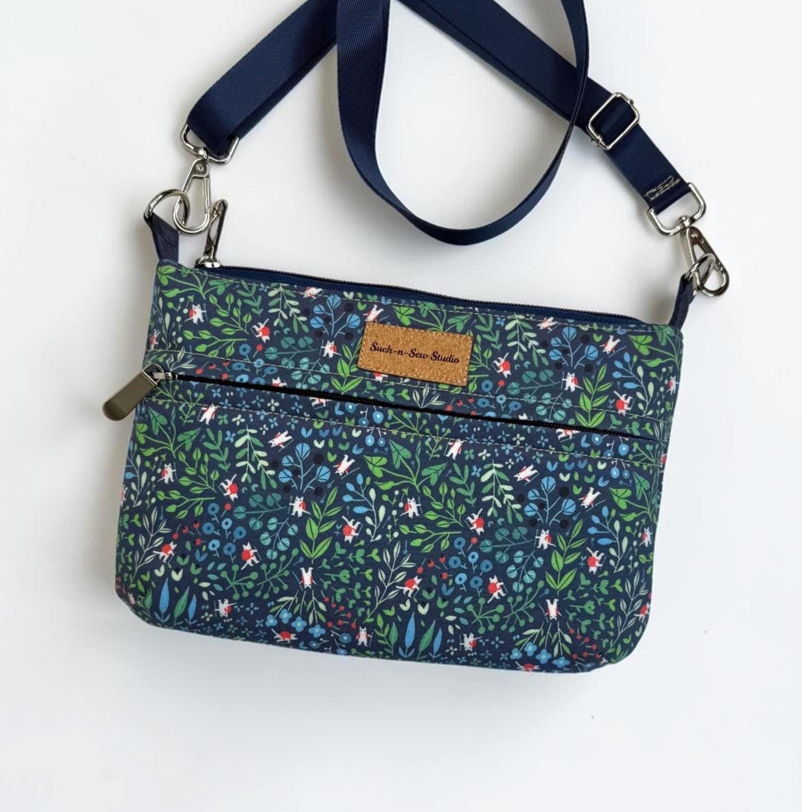 Tiny Cat Wearing Tiny Backpack in a Flower Field Crossbody