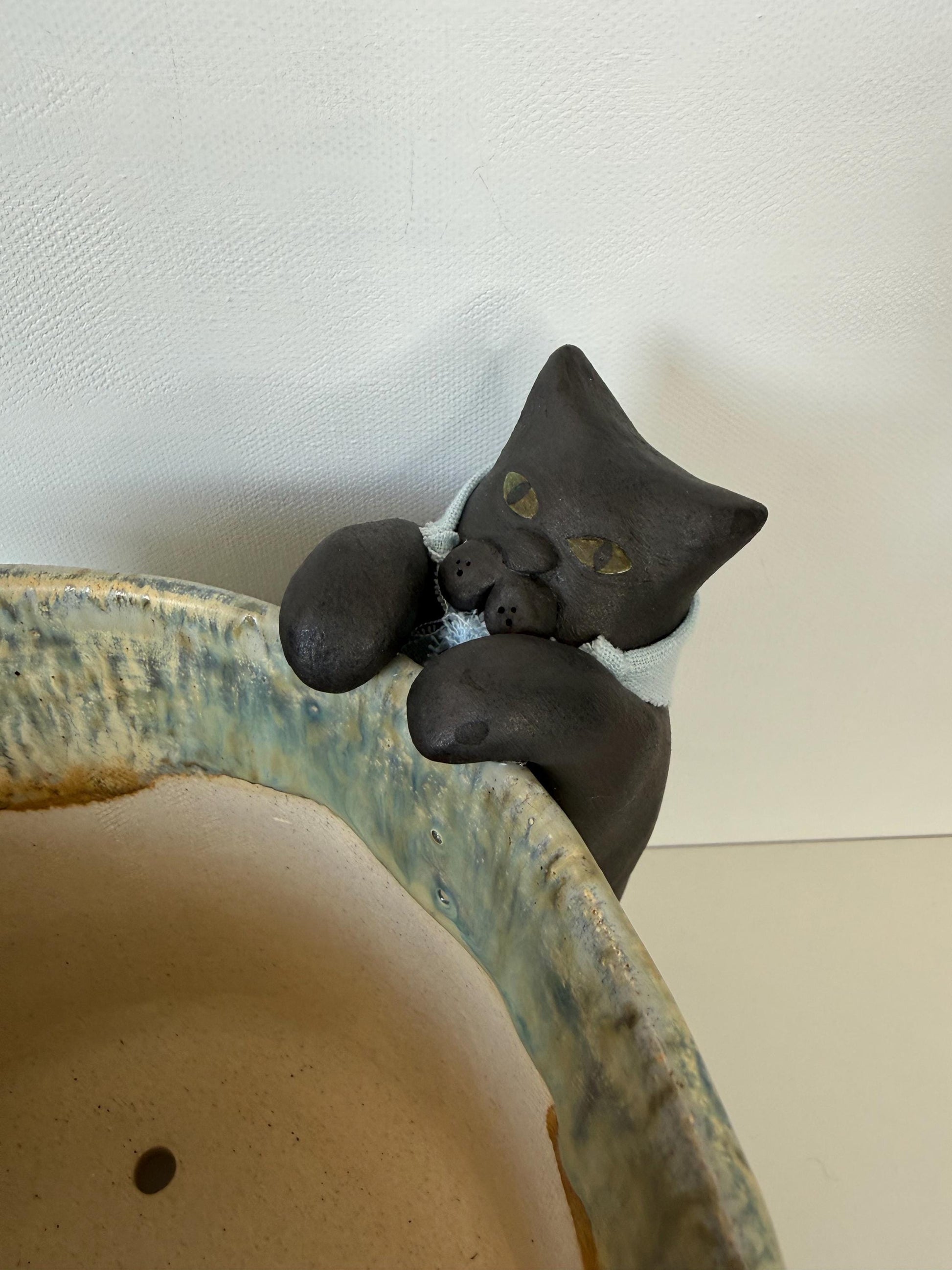 Curious Cat Peeking into a Planter