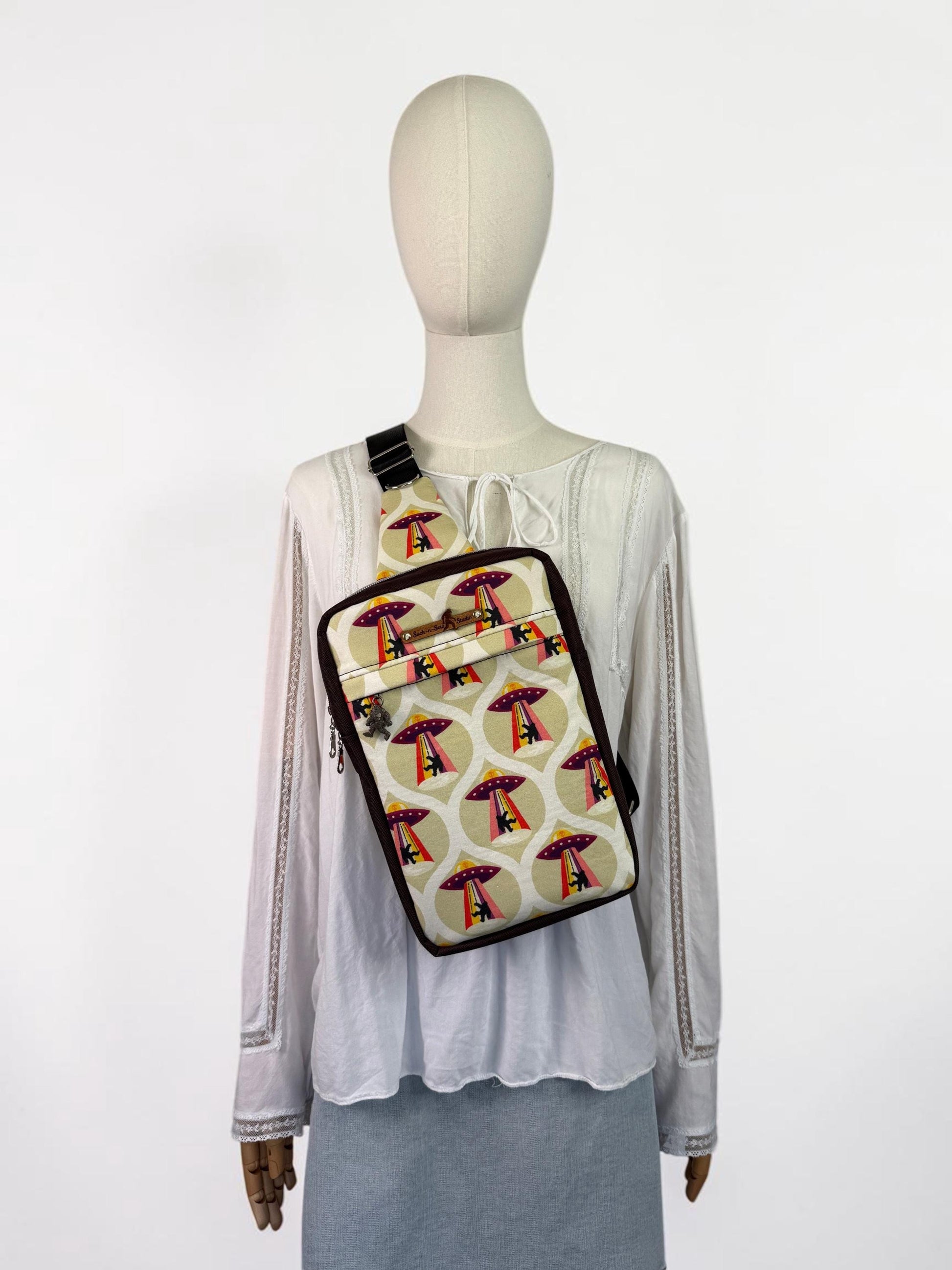 Groovy Aliens Abducting Bigfoot Sling Bag