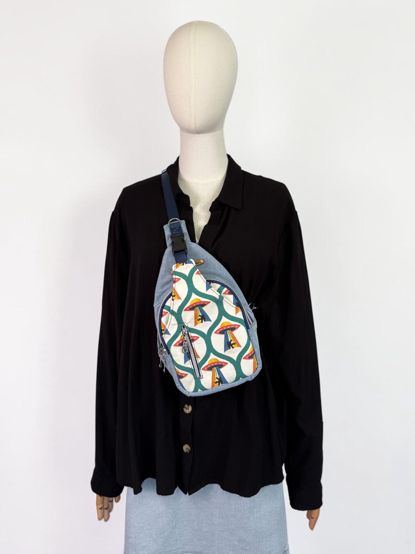 Alien Abducting Bigfoot Sling Crossbody Bag