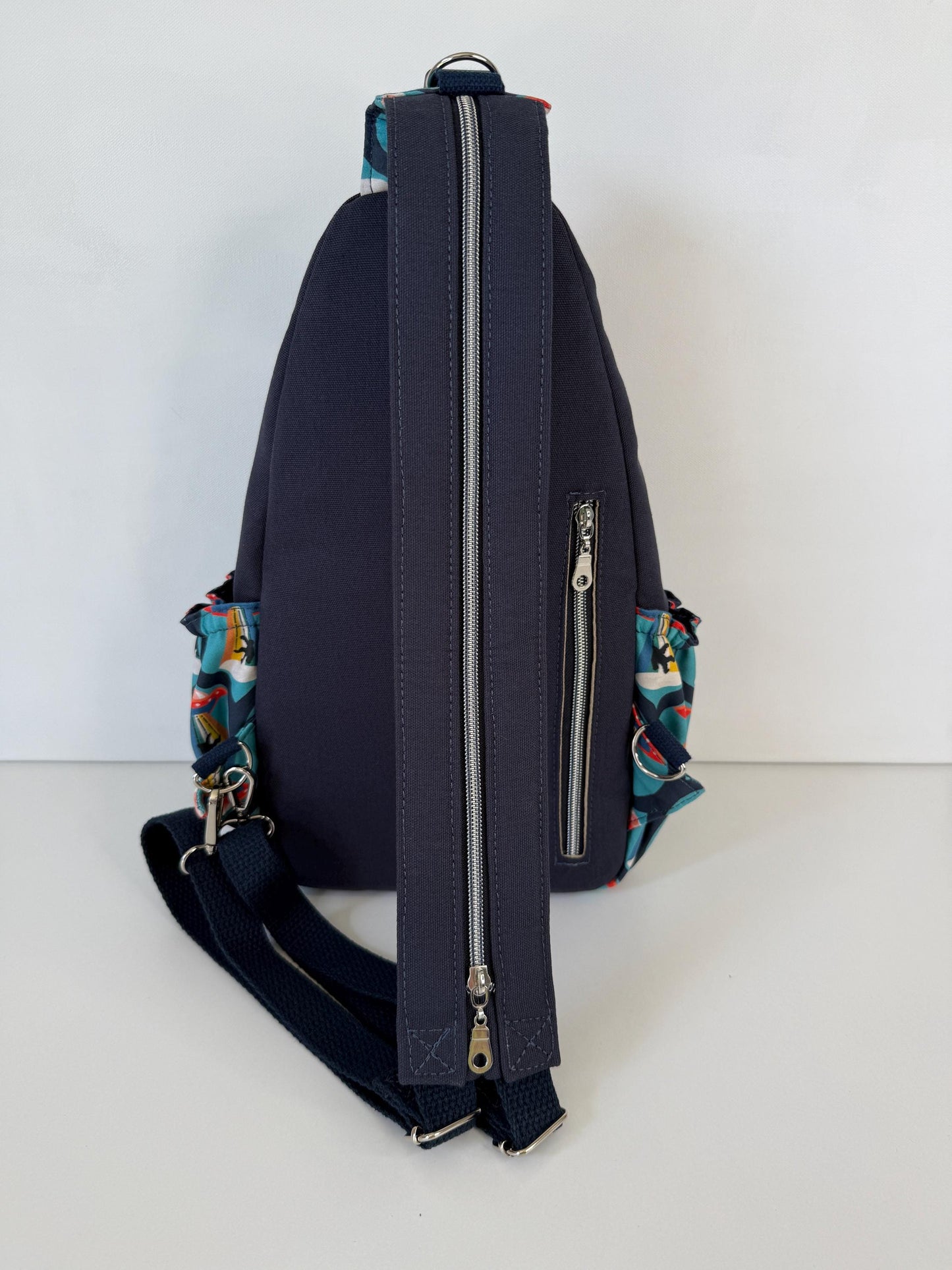 Groovy Alien Abducting Bigfoot Convertible Backpack Crossbody Sling